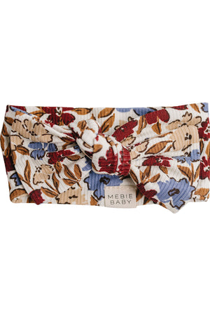 Colorful ribbed bamboo head wrap featuring a desert floral pattern, designed by Mebie Baby for stylish and practical use.