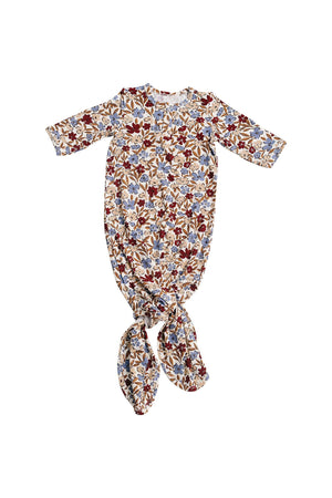 A floral-patterned knot gown in soft bamboo fabric, featuring earthy tones and long sleeves, designed for baby girls aged 0-3.