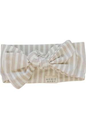 Taupe striped ribbed head wrap from Mebie Baby, crafted from soft bamboo fabric. This stylish accessory is designed for babies, ensuring comfort and a perfect fit as they grow.
