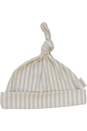 Taupe striped ribbed newborn knot hat made from soft bamboo rayon, featuring a knotted top and a folded brim.
