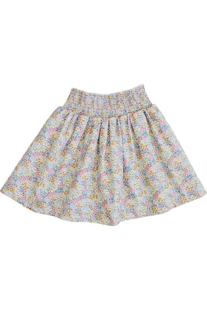A colorful, floral-patterned skirt with a smocked waist, designed for comfort and play. Ideal for toddlers and young children.