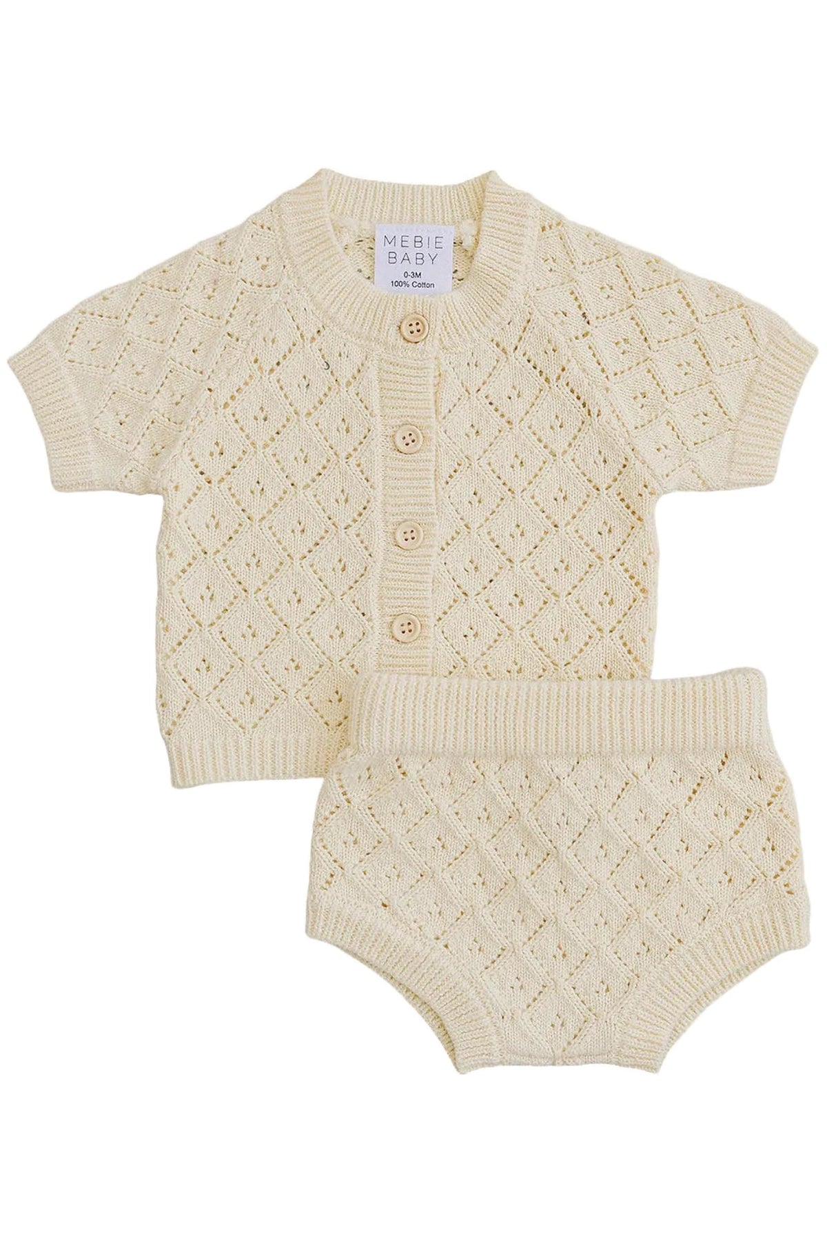 Cream-colored short-sleeve cardigan and matching bloomer set, featuring a textured diamond pattern. Made from soft, breathable cotton, this outfit is perfect for warm weather and comfortable play.