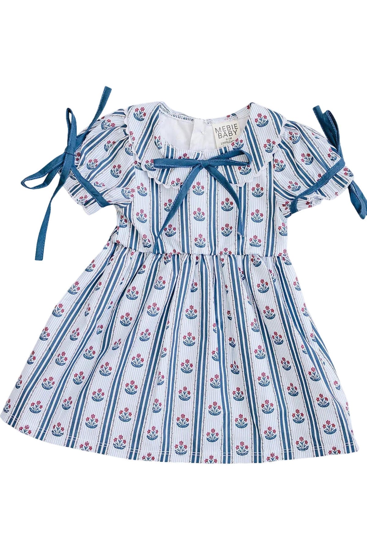 A blue cotton dress featuring a floral block print with stripes, designed for babies. The dress has short sleeves with tied ribbons and is perfect for everyday wear or special.