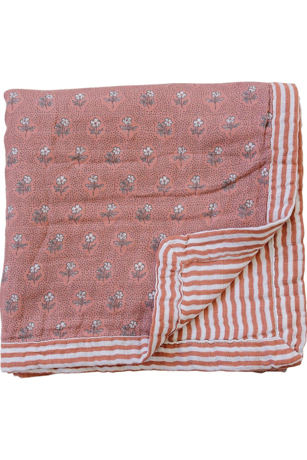 Pink floral and striped muslin crib quilt, folded, showcasing soft cotton fabric with vintage-inspired design.