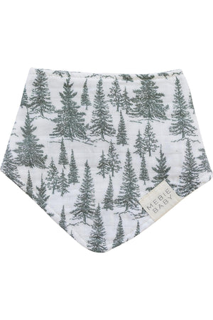 White muslin bib with green forest tree patterns, featuring a Mebie Baby label. Made from 100% cotton.