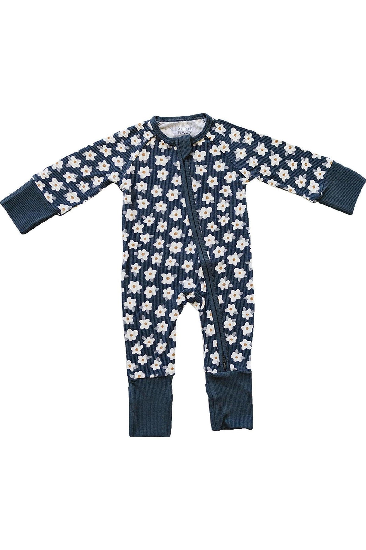 Navy baby pajamas with white daisy print and ribbed cuffs, featuring a central zipper for easy changes.
