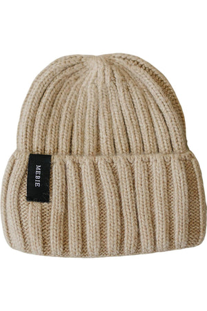 Tan chunky knit beanie made of 100% angora wool with a black Mebie label, suitable for babies.
