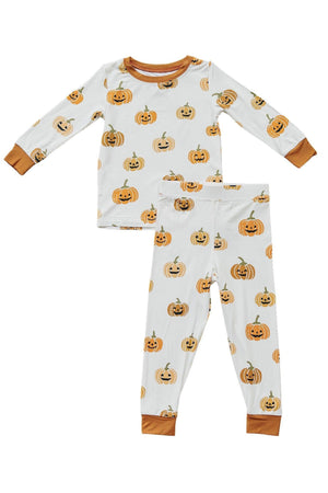 White pajama set with orange pumpkin print, featuring long sleeves and pants with brown cuffs. Made from bamboo fabric.