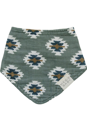 Green muslin bib with white and navy Aztec pattern, featuring a Mebie Baby label on the corner.