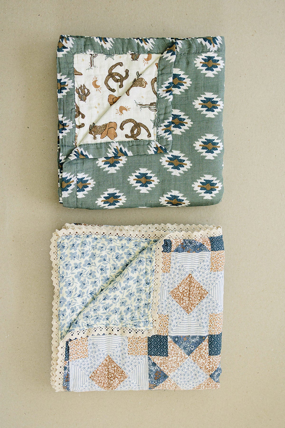 Two folded quilts: one with a green Southwest Aztec pattern, and another with a floral patchwork design and lace trim.