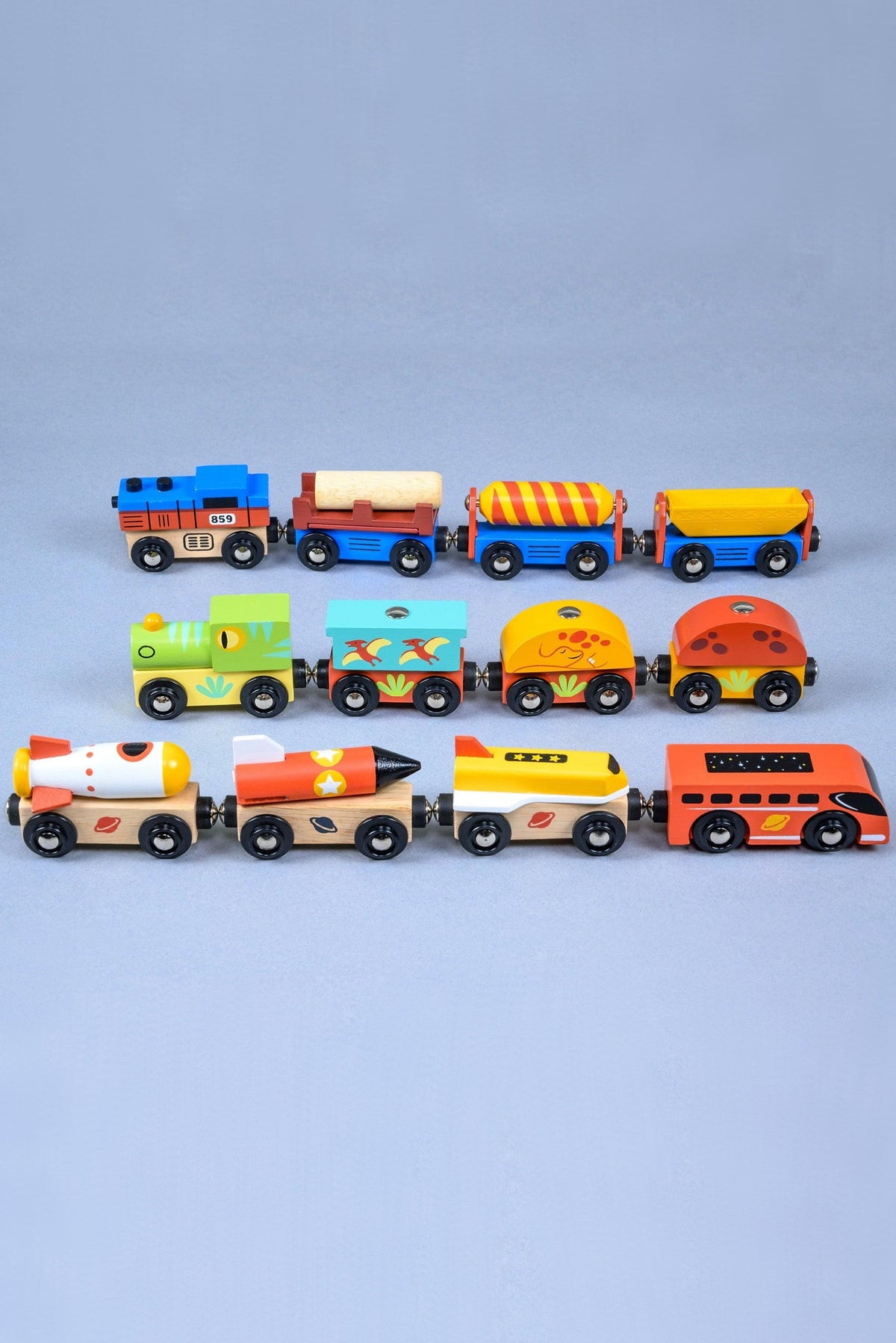A colorful assortment of wooden toy trains and carriages arranged in rows, featuring vibrant designs and playful themes. Ideal for imaginative play, these eco-friendly toys promote sustainable, family-friendly fun.