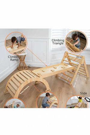 A wooden Pikler triangle and climbing ramp are set up indoors, featuring a smooth slide and climbing features.