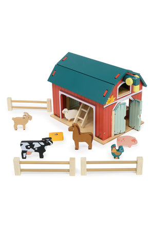 Toy barn set with animals on a white background