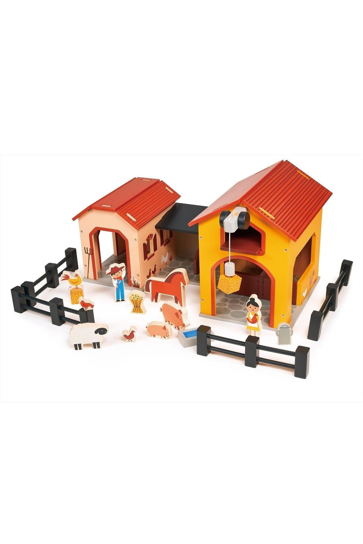 Wooden farm playset with barn, stable, animals, and figures. Features red roofs, black fences, and a working pulley.