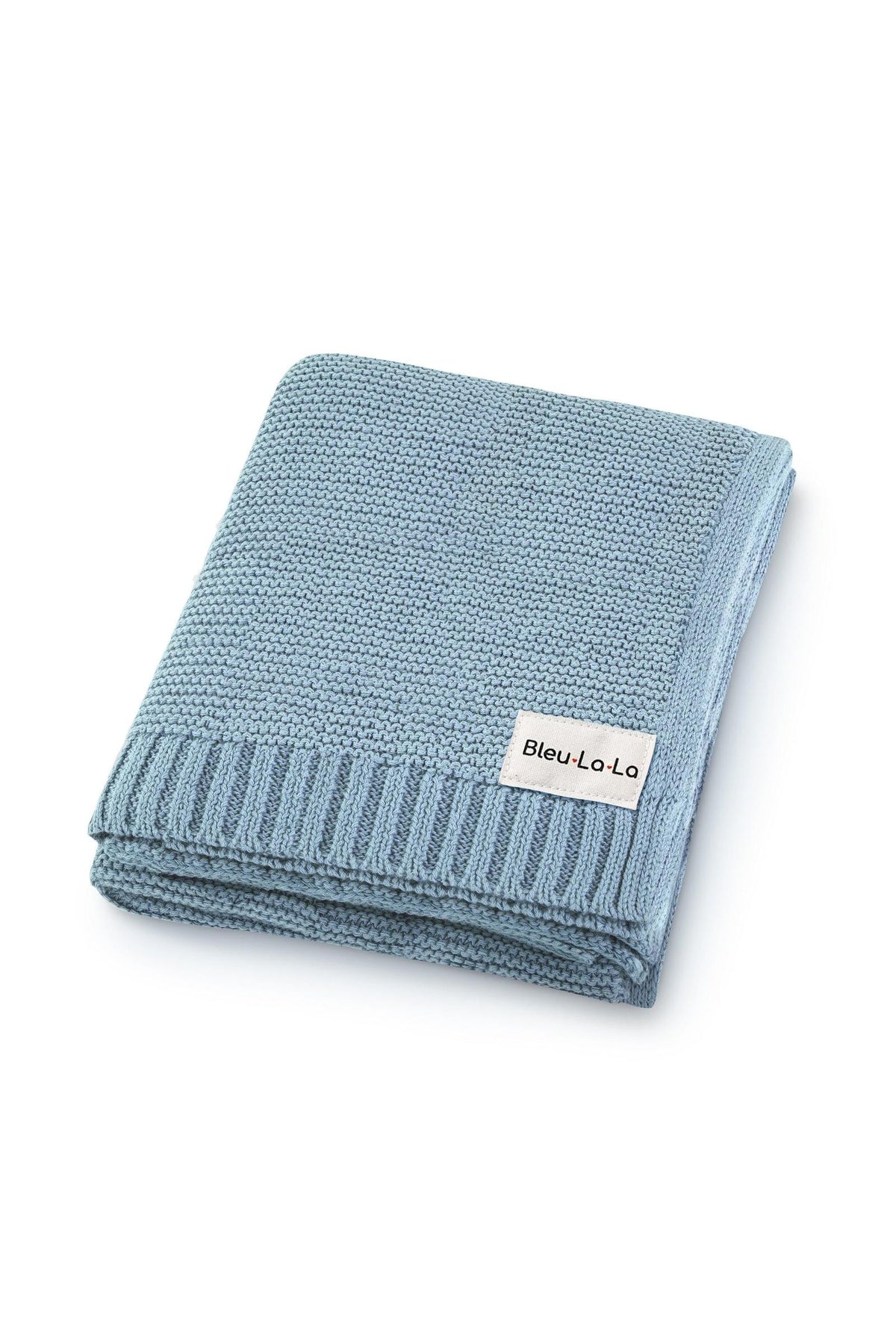 Light blue knit blanket folded neatly, featuring a Bleu-La-La label. Made from organic cotton, perfect for babies.