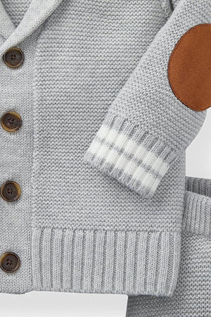 Gray heather cardigan featuring a shawl collar, elbow patches, and faux horn buttons, paired with matching leggings that have striped rib trim. Made from soft, organic cotton for babies.