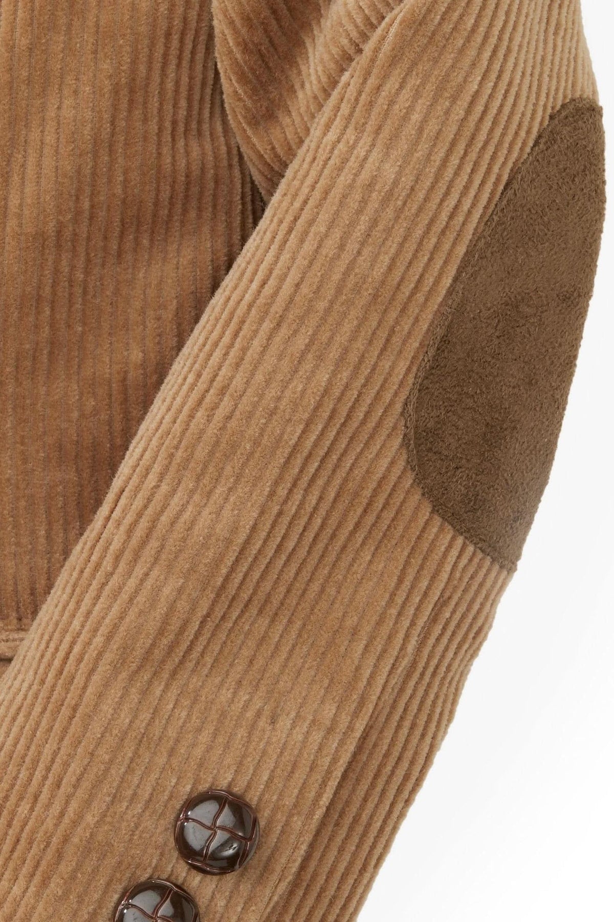 Close-up of a medium brown corduroy blazer for boys featuring faux suede elbow patches and decorative buttons, made from soft organic cotton for sustainable style. Perfect for any occasion.