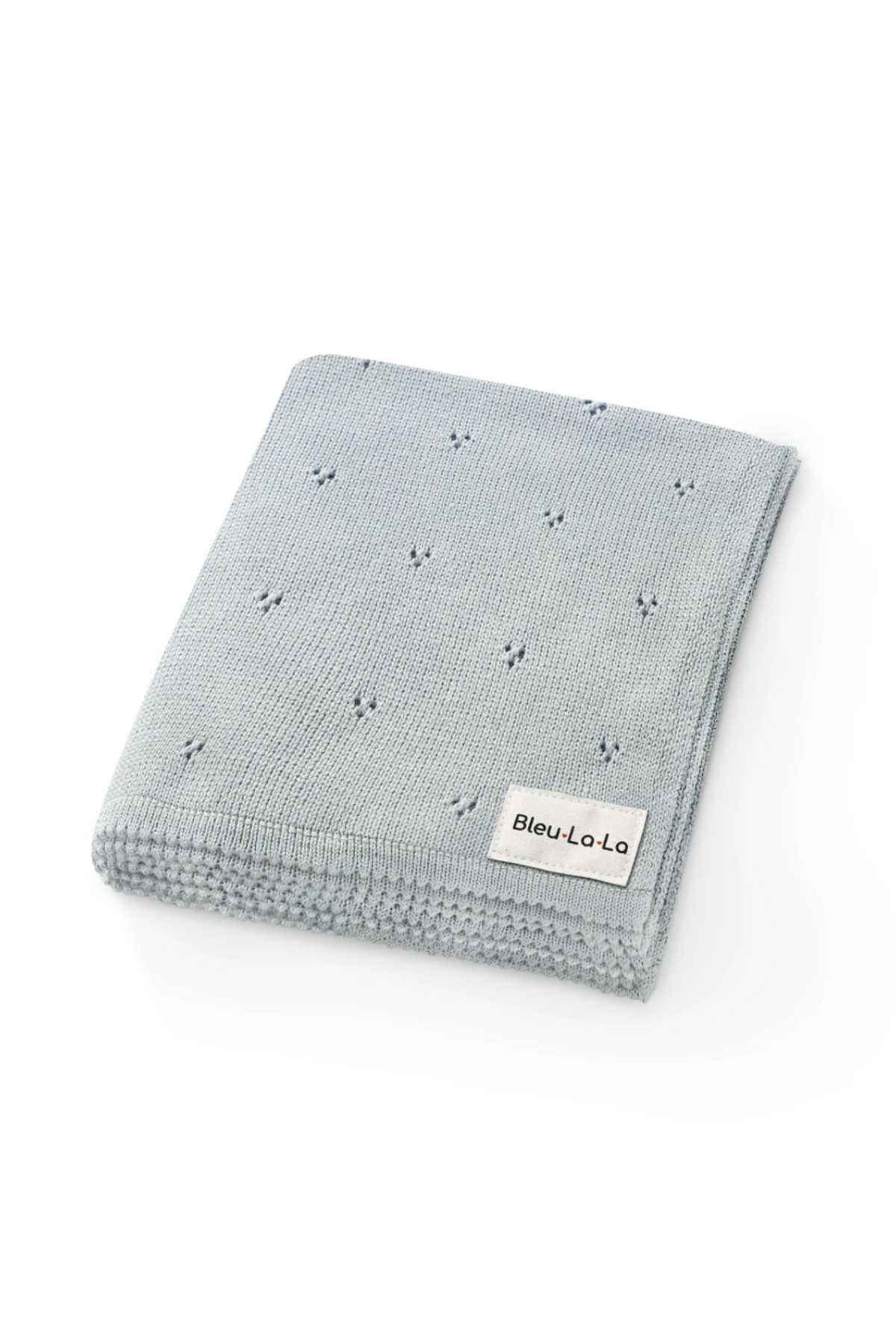 Light blue knit baby blanket with delicate pointelle pattern and a Bleu-La-La label, made from organic cotton.