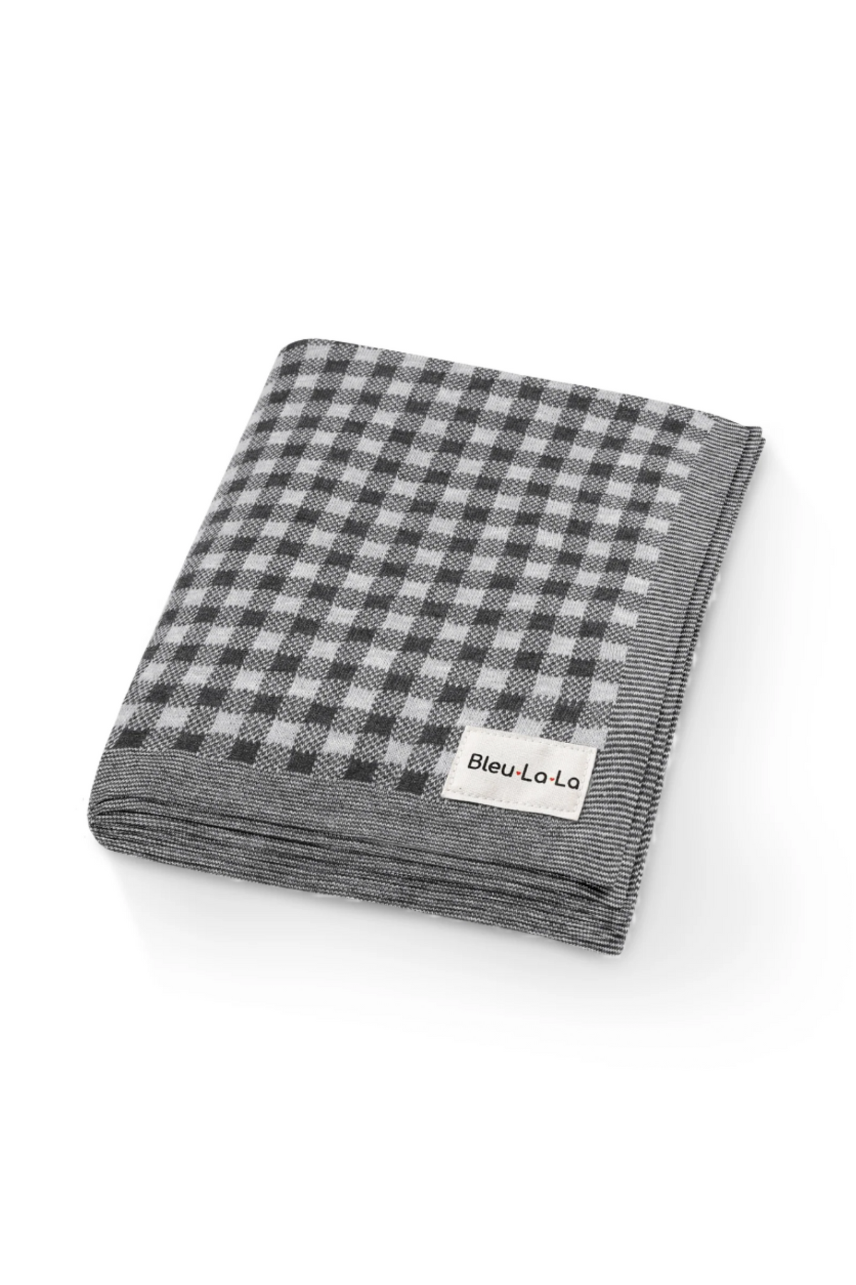A folded checkered knit blanket in gray tones, labeled Bleu La La, made from soft, breathable cotton fabric.