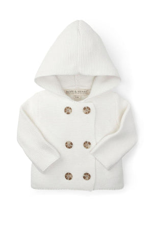 A soft white hooded sweater from Hope & Henry, featuring a seed stitch knit and double-breasted button front for baby.