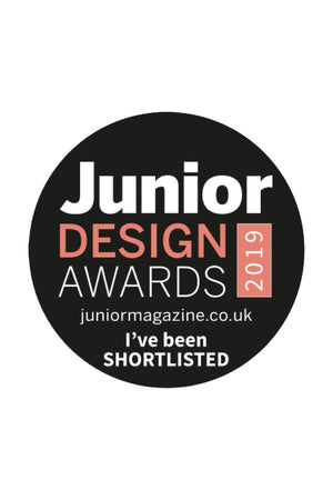A circular award badge featuring Junior Design Awards 2019 text, indicating a product has been shortlisted for recognition.
