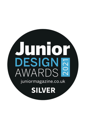 A black and white circular logo featuring the text Junior Design Awards 2021 and SILVER in blue and white. The logo signifies an award won in the design category.