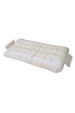 A thick, cream-colored cushion with tufted design rests on a white background, ideal for added comfort on a rocker.