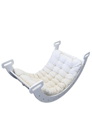 A white rocking seat cushion with a tufted design, perfect for adding comfort to a Hazel Rocker.