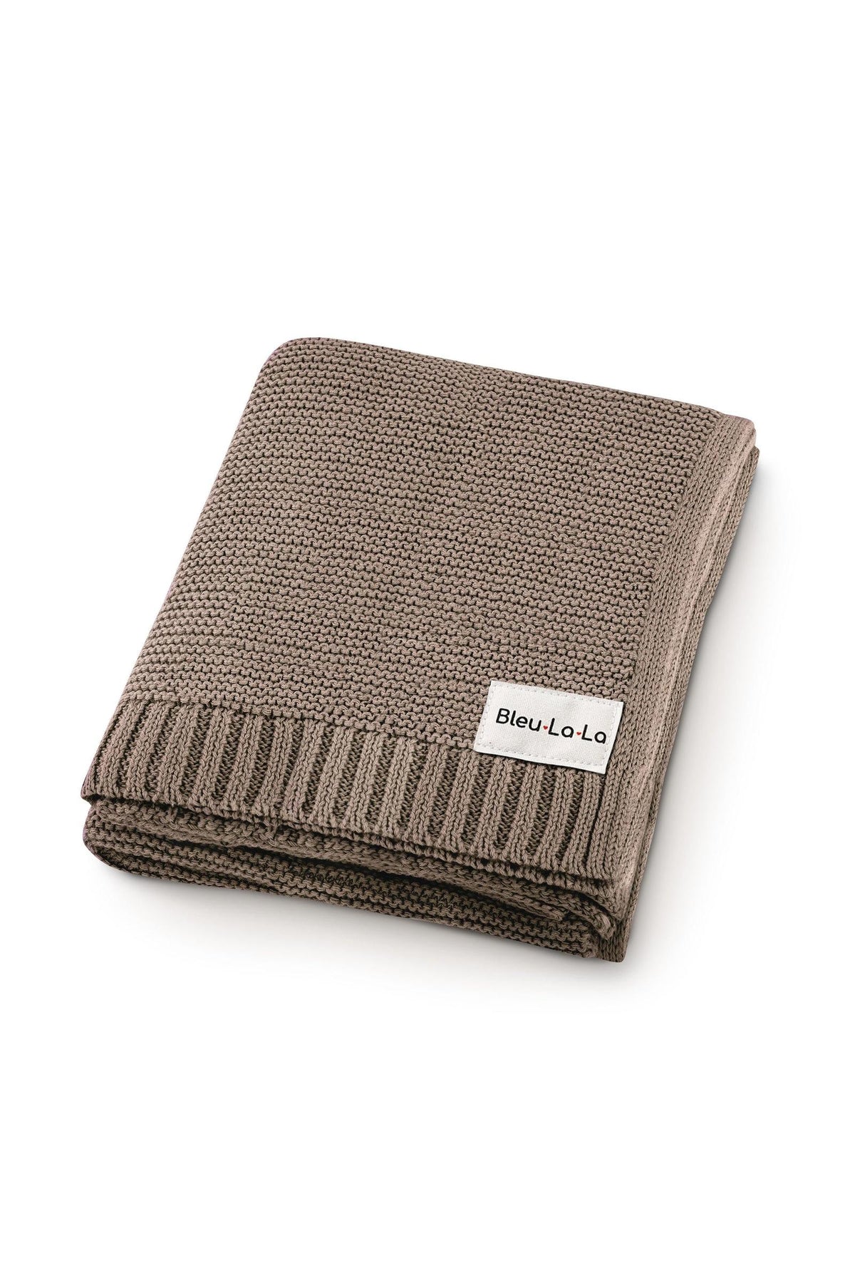 A folded, taupe knit baby blanket with a ribbed edge and a Bleu La La label on it.