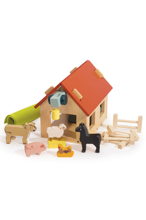 A wooden toy farm set featuring a classic barn with a red roof, surrounded by colorful animal figures including a cow, sheep, pig, and horse. Ideal for imaginative play.