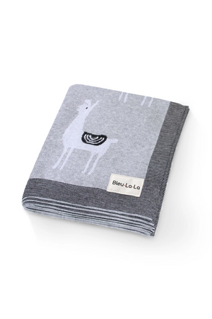 Gray knit blanket with white llama design and striped border, featuring a Bleu La-La label.