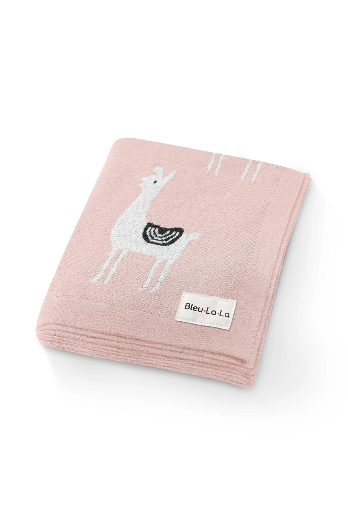 A folded pink blanket with white llama design, featuring a Bleu-La-La label, made from soft cotton.