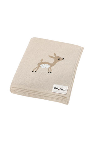 Beige knit blanket with a deer design, labeled Bleu-La-La, made from soft, eco-friendly materials.