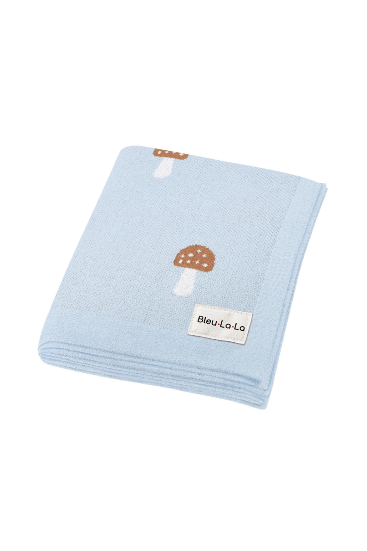 Light blue blanket with brown mushroom patterns, folded neatly, featuring a Bleu La La label.