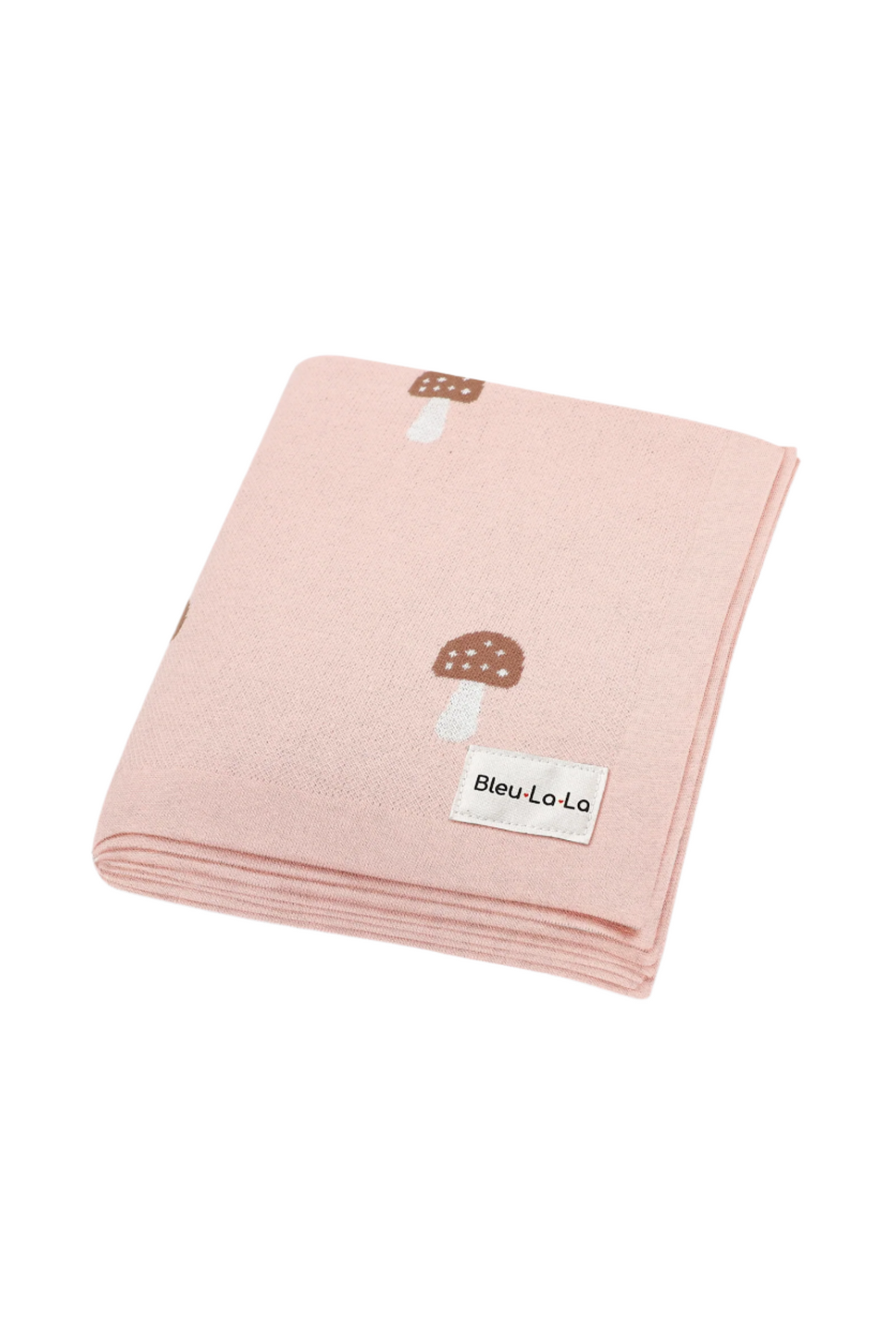 Pink knit blanket with brown mushroom patterns, featuring the label Bleu La La. Made from soft, breathable material.