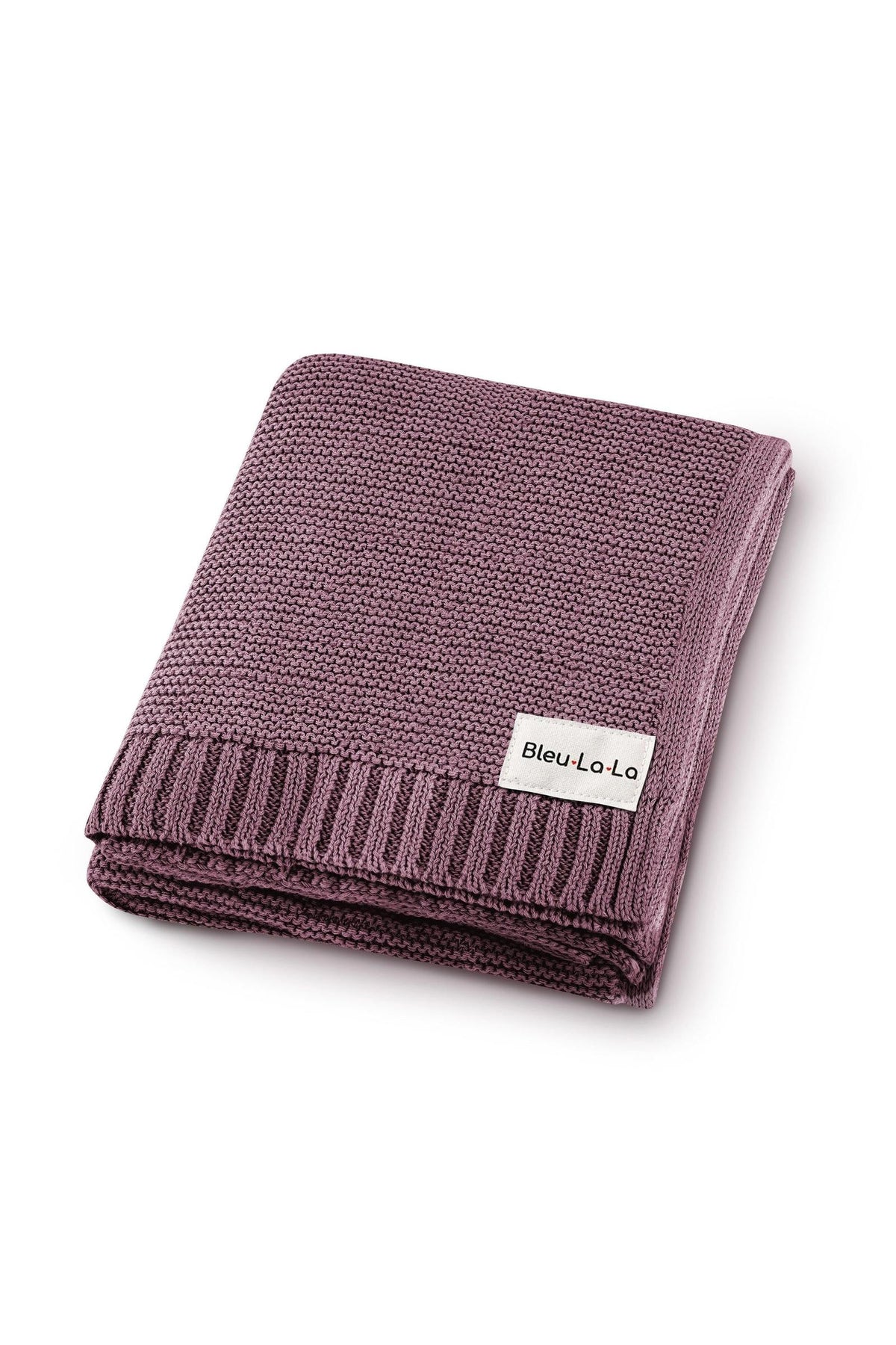 A folded mauve knit blanket with a label reading Bleu-La-La on a white background.