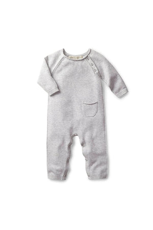 Light heather grey organic cotton baby romper features a raglan design, soft rolled edges, a tiny front pocket, and buttons at the legs and shoulder for easy dressing.