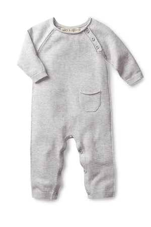 A light gray organic cotton romper features long sleeves, a small chest pocket, and snap closures at the bottom.