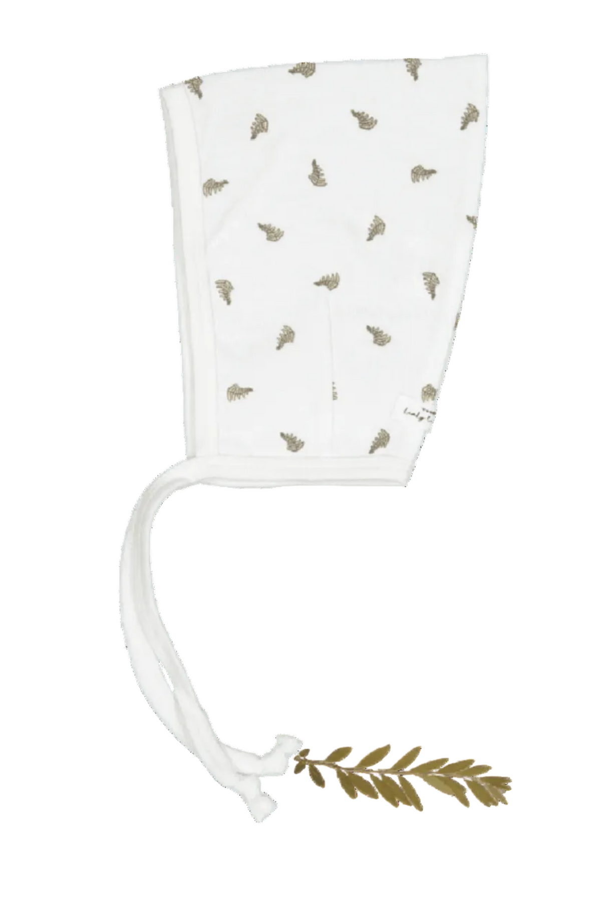 A white cotton bonnet featuring a leaf print, designed for comfort and style. Made from soft, stretch fabric with eco-friendly materials, perfect for young children.