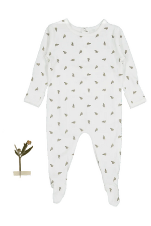 A white cotton baby romper featuring a scattered leaf pattern, designed with long sleeves and footed bottoms. The soft, organic material ensures comfort for infants aged 0-3 months.
