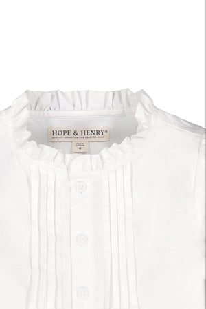 Close-up of a white Hope & Henry blouse featuring a ruffled collar and pintucks, designed for baby girls.