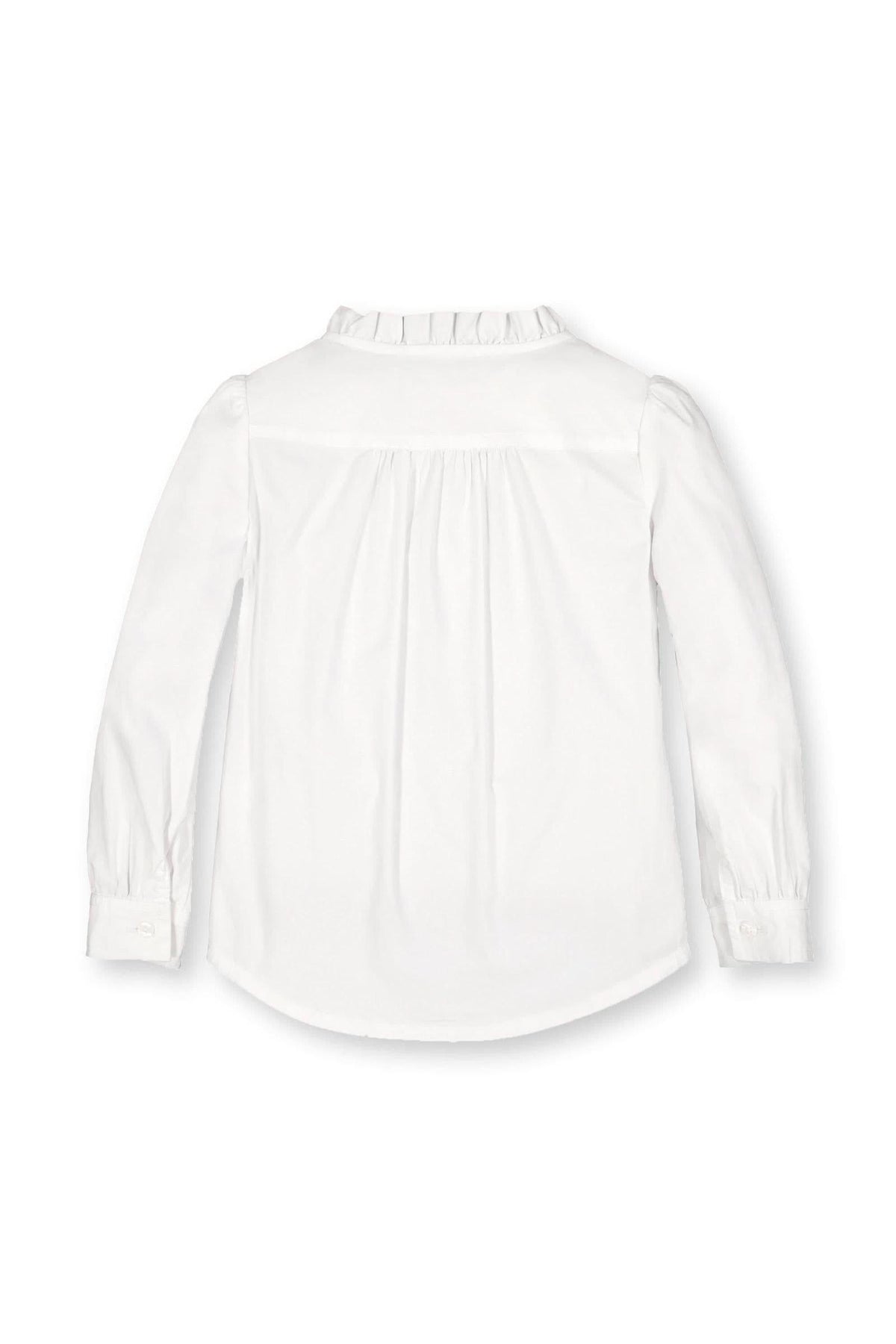 Back view of a white organic cotton blouse for baby girls, featuring a ruffled collar and buttoned cuffs, showcasing pintuck.
