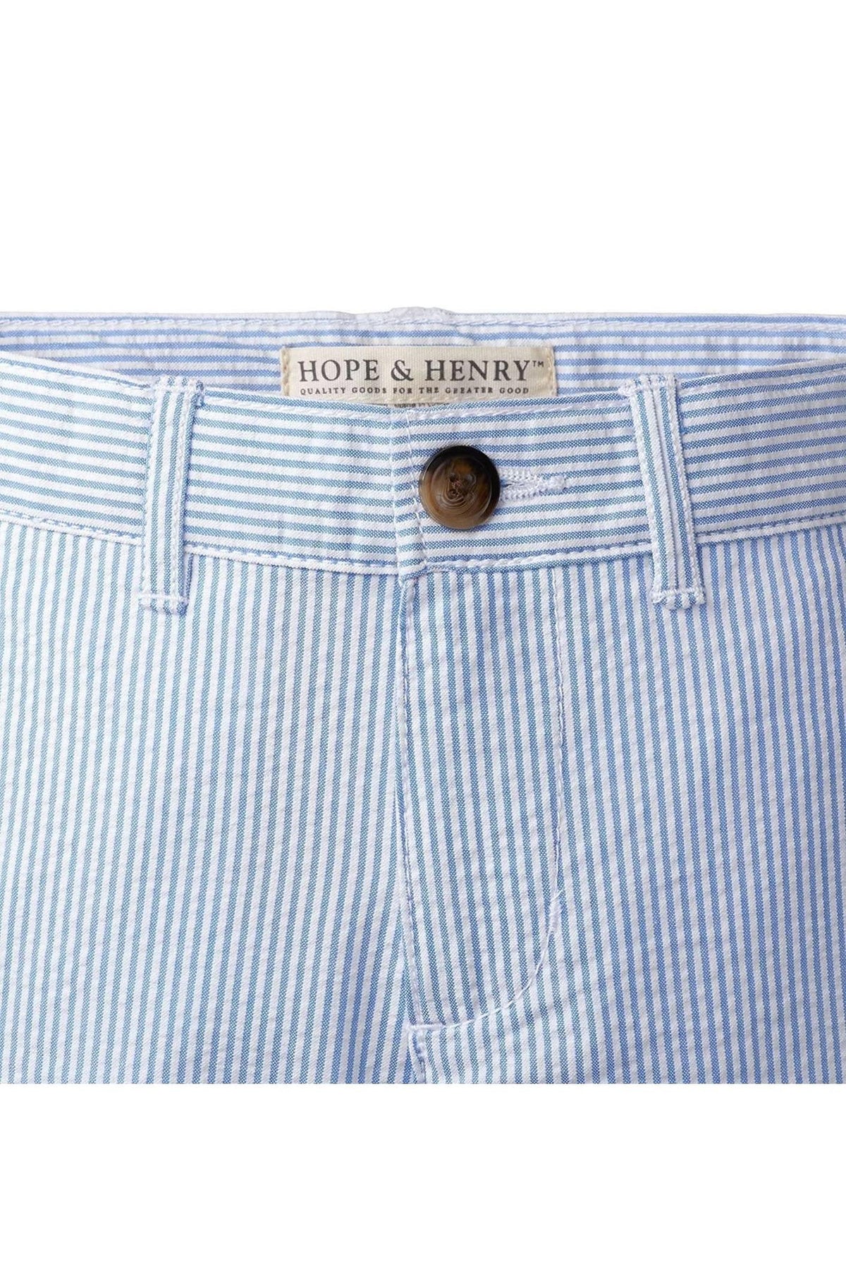 Light blue seersucker fabric with white stripes makes up these classic boys suit pants by Hope & Henry. The stylish design includes a button closure, perfect for special occasions.