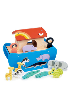 Wooden toy ark with colorful animals and Noah figures, featuring giraffes, zebras, elephants, and crocodiles for shape sorting.
