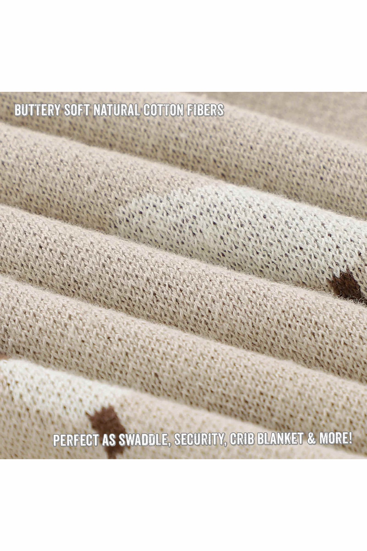 Close-up of a beige knit fabric with a small brown sheep pattern, showcasing its soft texture and fine weaving.