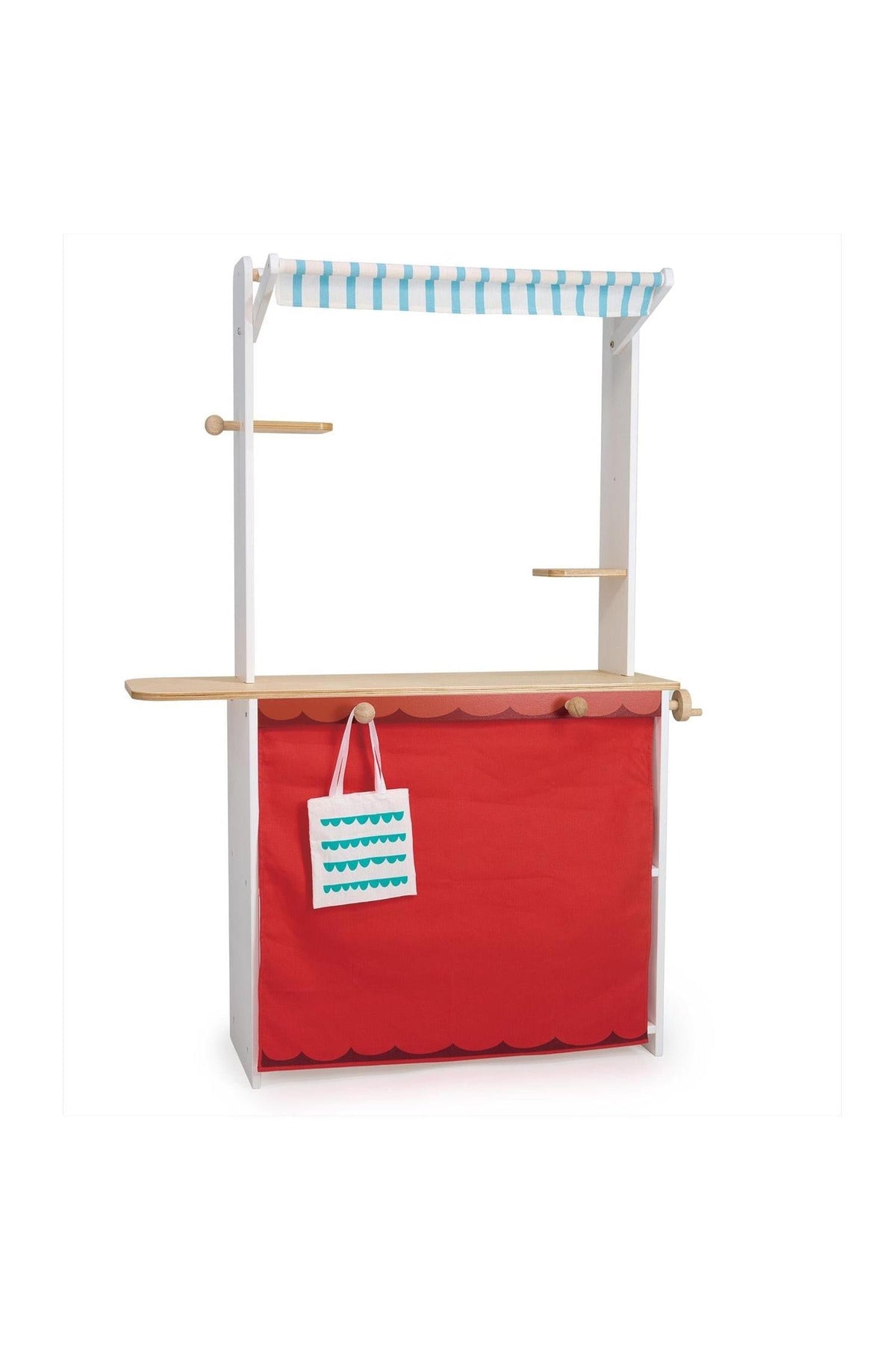 Wooden toy shop stand with blue-striped awning, red curtain, and a white tote bag hanging in front.