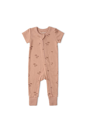 A soft, organic cotton short sleeve romper in a warm beige hue features a subtle palm tree pattern and a convenient two-way zip closure, perfect for summer outfits.