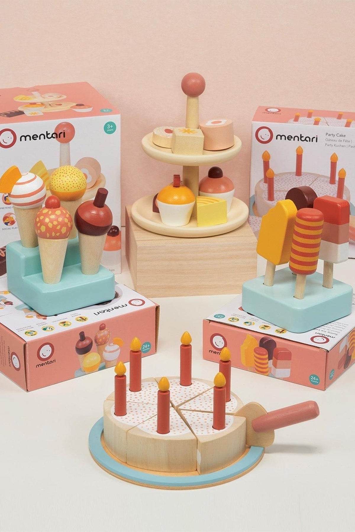 Mentari Wooden Toys Sweet Treats Bundle features wooden cakes and ice creams in pastel colors with playful designs.
