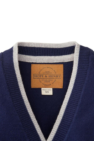 Navy cardigan with grey trim, featuring a Hope & Henry label and a size XS tag.