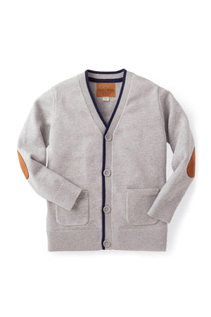 Grey organic cotton cardigan featuring navy tipping, faux suede elbow patches, and front pockets, suitable for children sizes 2-16.